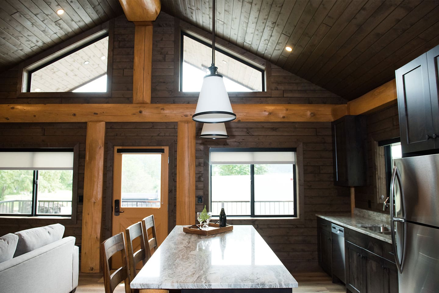Interior living area of log cabin kit, BC Log Home Builder.