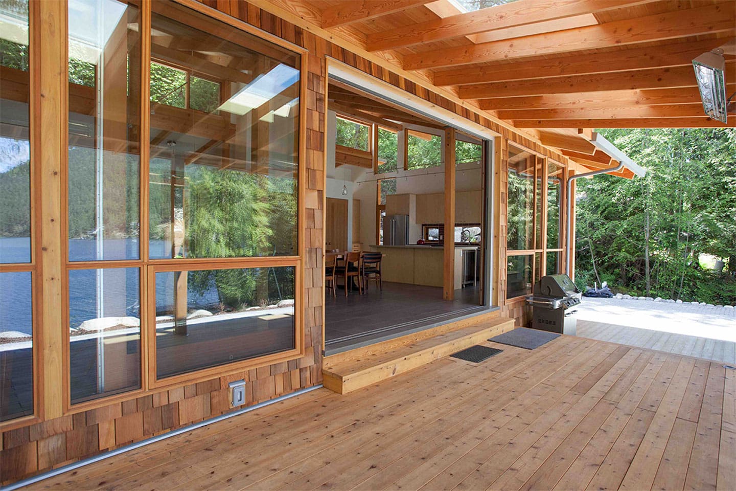 Exterior deck view of Timber Frame Log Home.