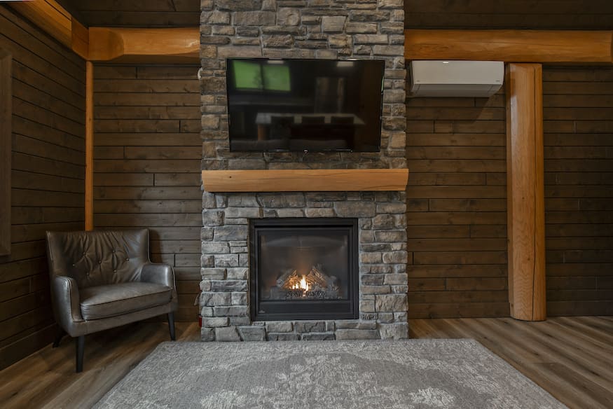 Fireplace in custom built twin eagle log cabin kits