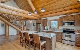 Kitchen in BC Home Builders Custom Built Post and Beam Log Home.
