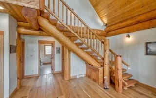 Custom Built Log Staircase in Post and Beam Log Home.