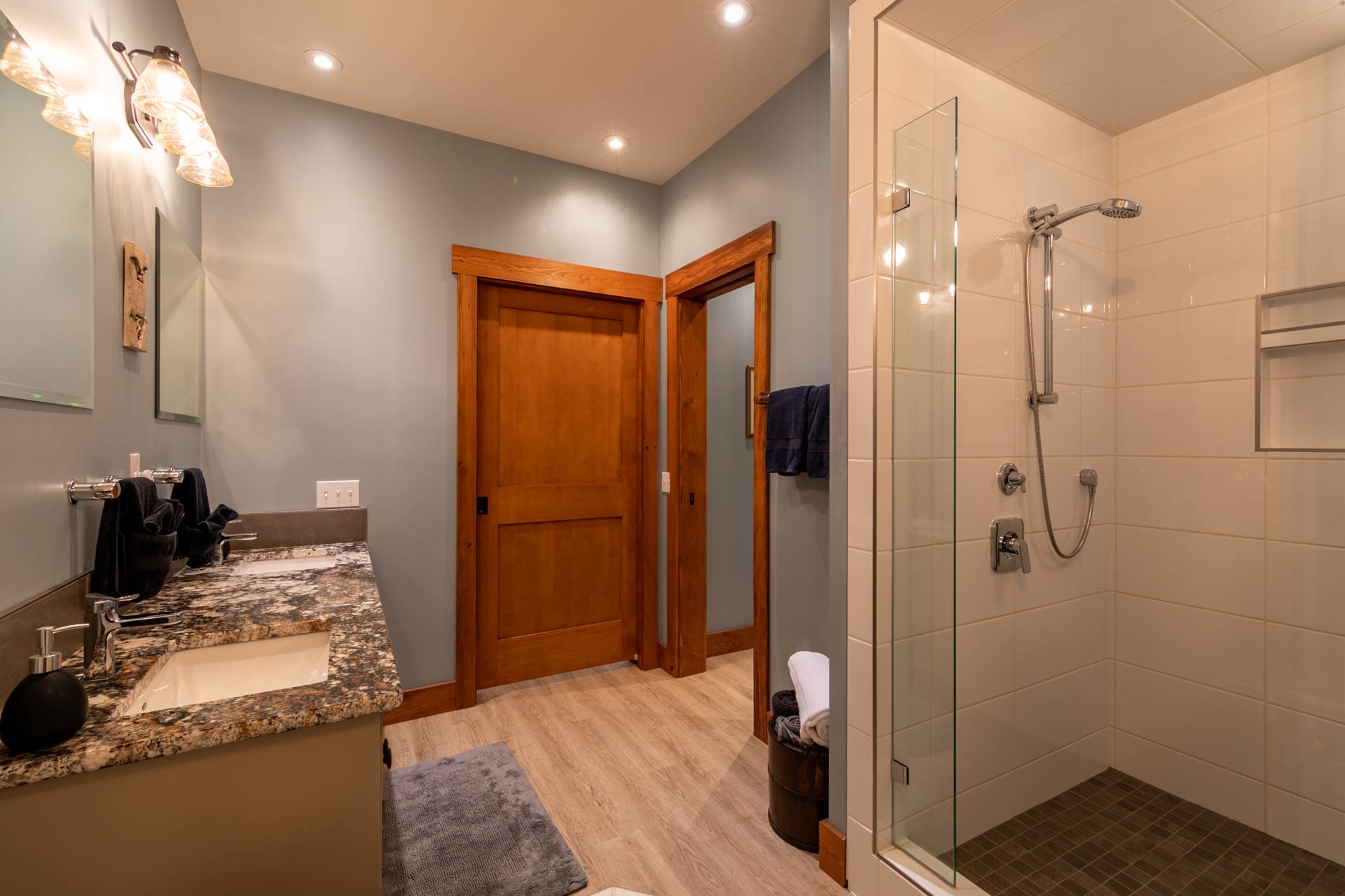 bathroom with shower in Golden Acres BC Built custom post and beam log home