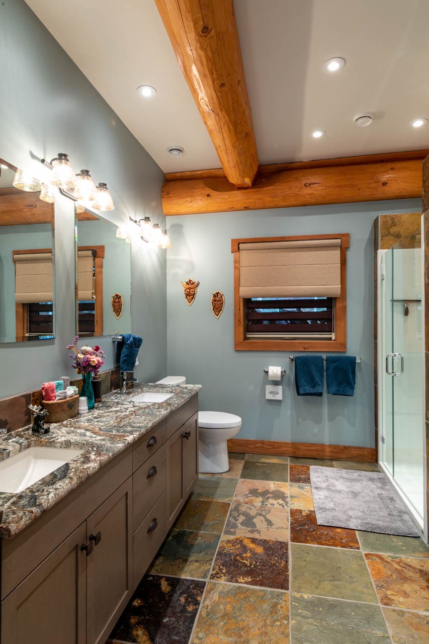 Bathroom vanity in Golden Acres post and beam custom built lodge.