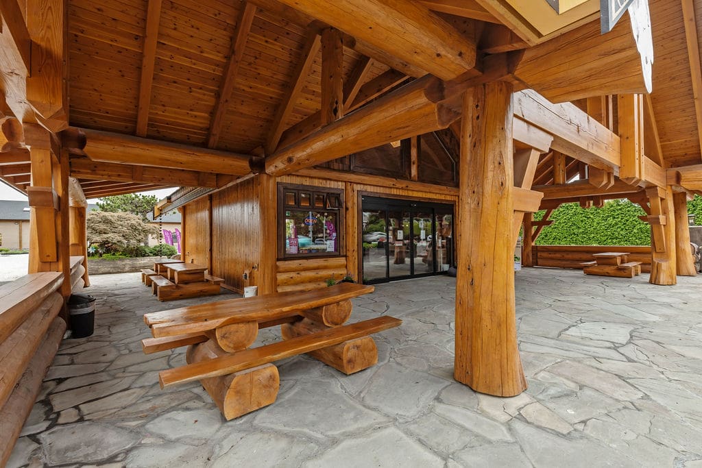 custom built post and beam timber frame log home. Log picnic table.