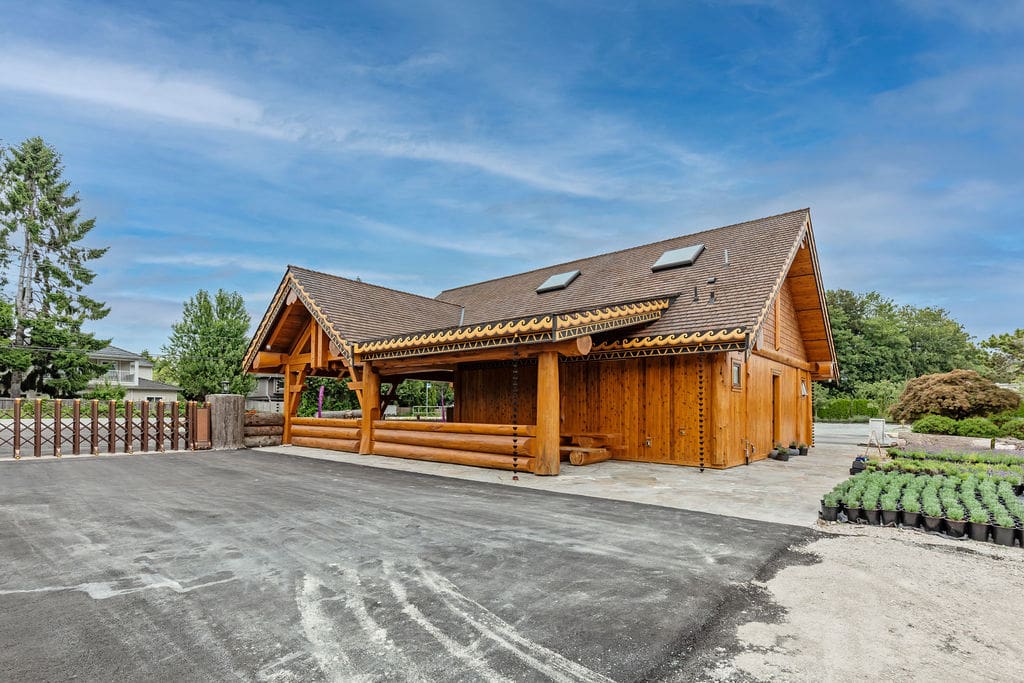 The exterior of BC custom built post and beam log home.