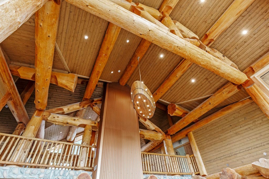 Bc homebuilders log post and beam home ceiling.