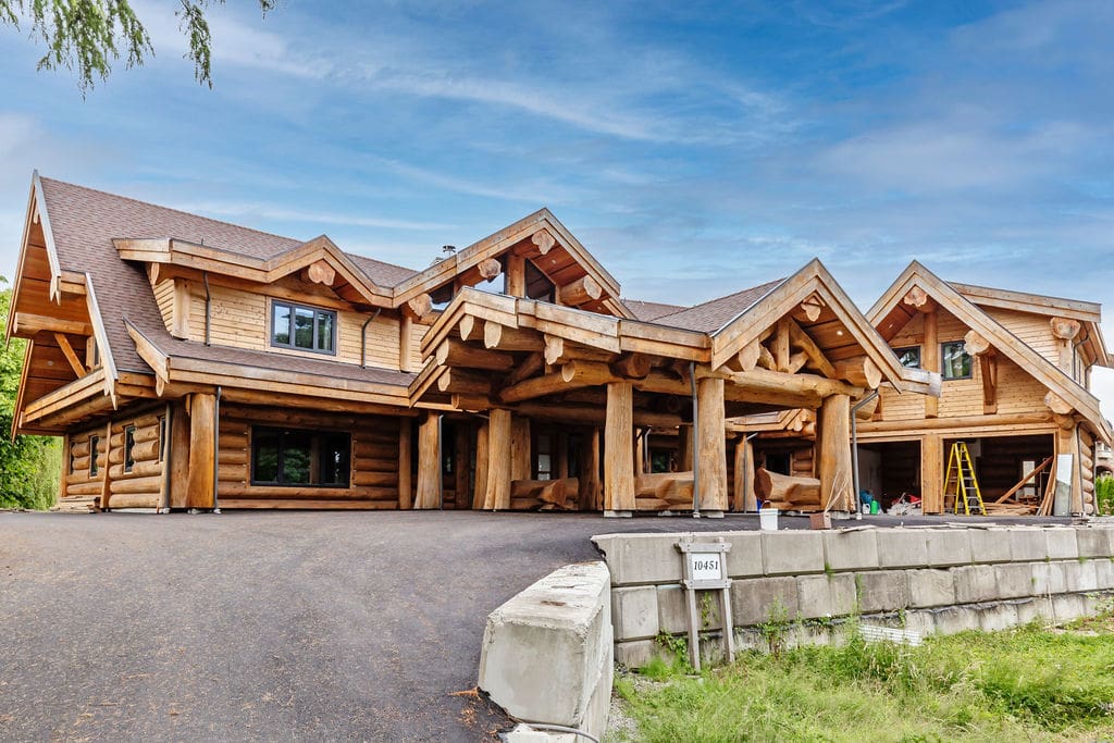 Exterior view of BC Custom-built post and beam log home.