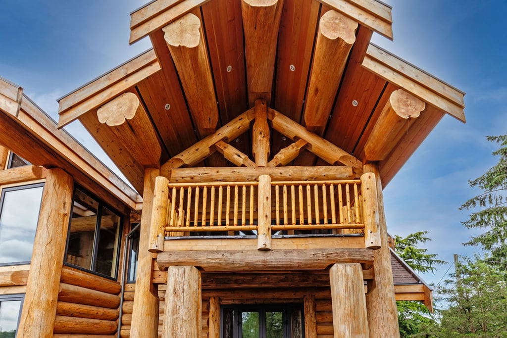 Custom-built post and beam log home British Columbia log home deck.