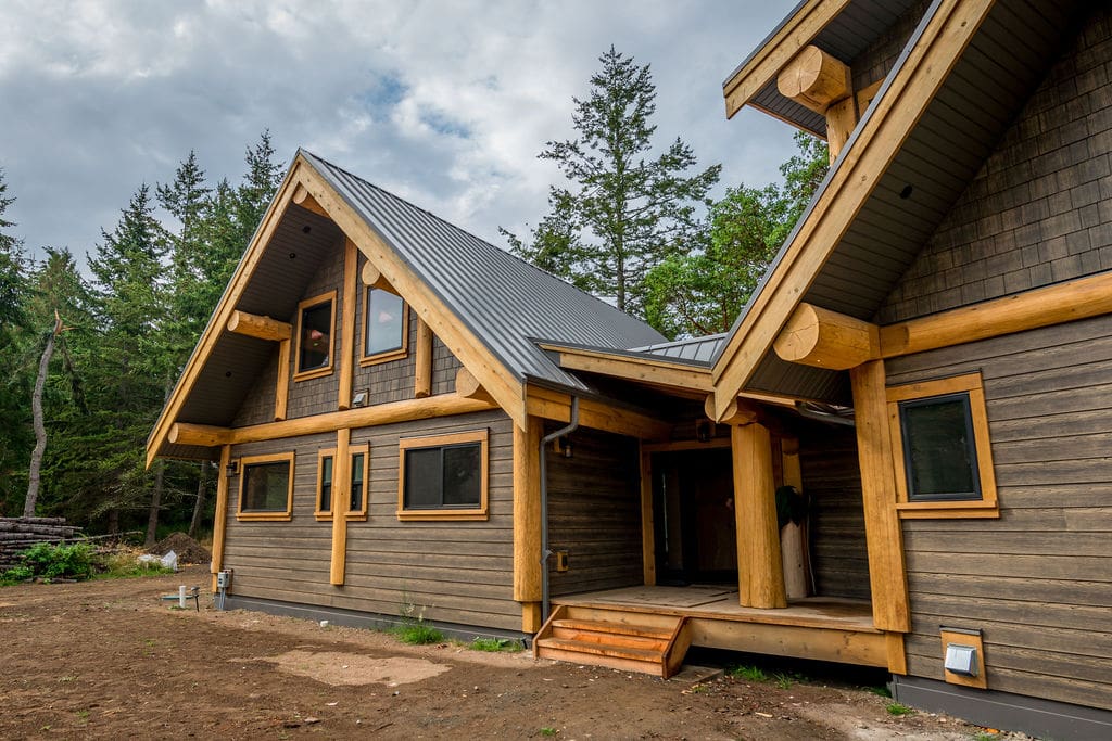exterior view of custom built connect log cabin kits